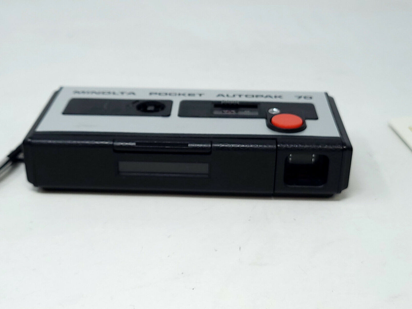 Vintage Minolta pocket autopak 70 - with flash cubes, stand, and manual
